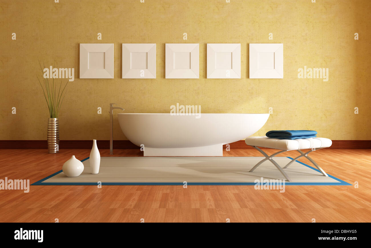 Vasca da bagno moderno di fronte un giallo parete in stucco Foto Stock