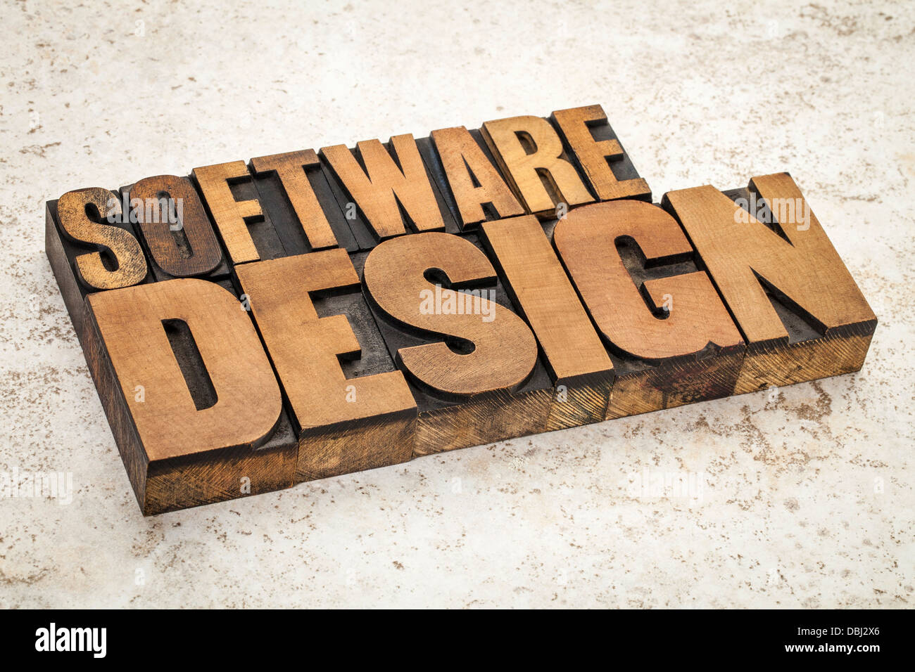 La progettazione del software testo nella stampa tipografica vintage tipo di legno su una piastrella ceramica sfondo Foto Stock