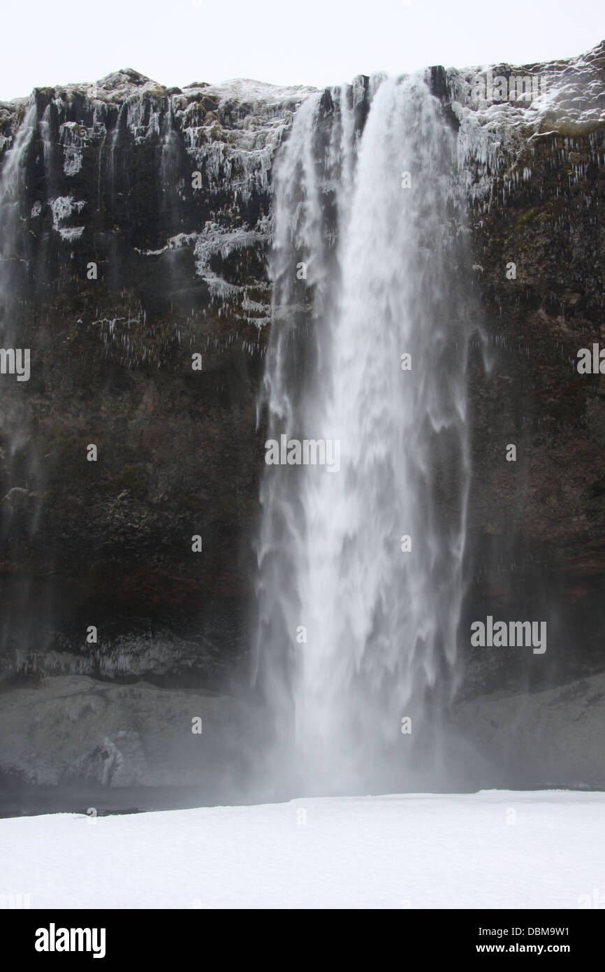 Cascata Seljalandsfoss in Islanda e nella neve Foto Stock