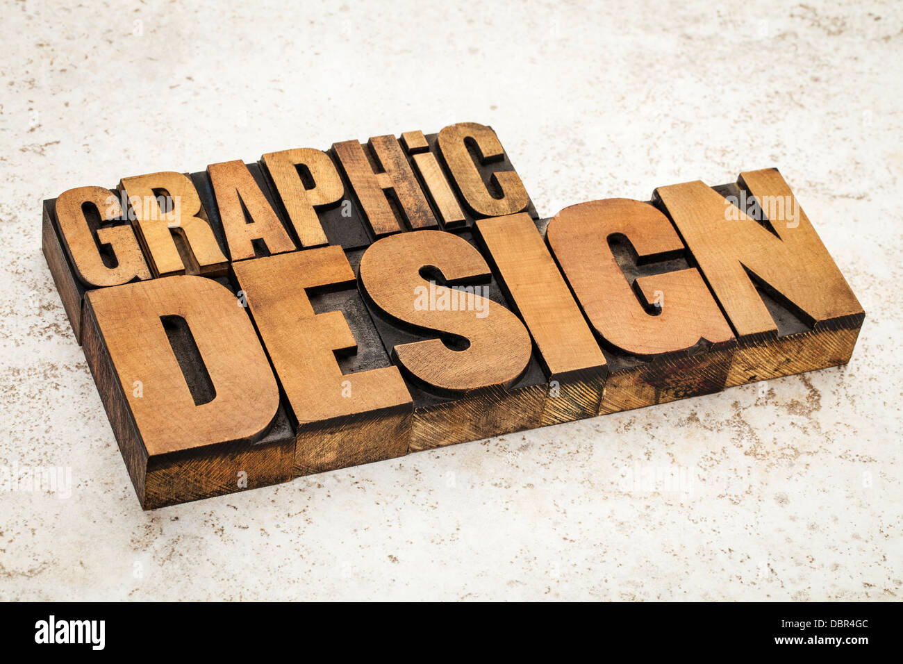 Graphic design testo nella stampa tipografica vintage tipo di legno su una piastrella ceramica sfondo Foto Stock