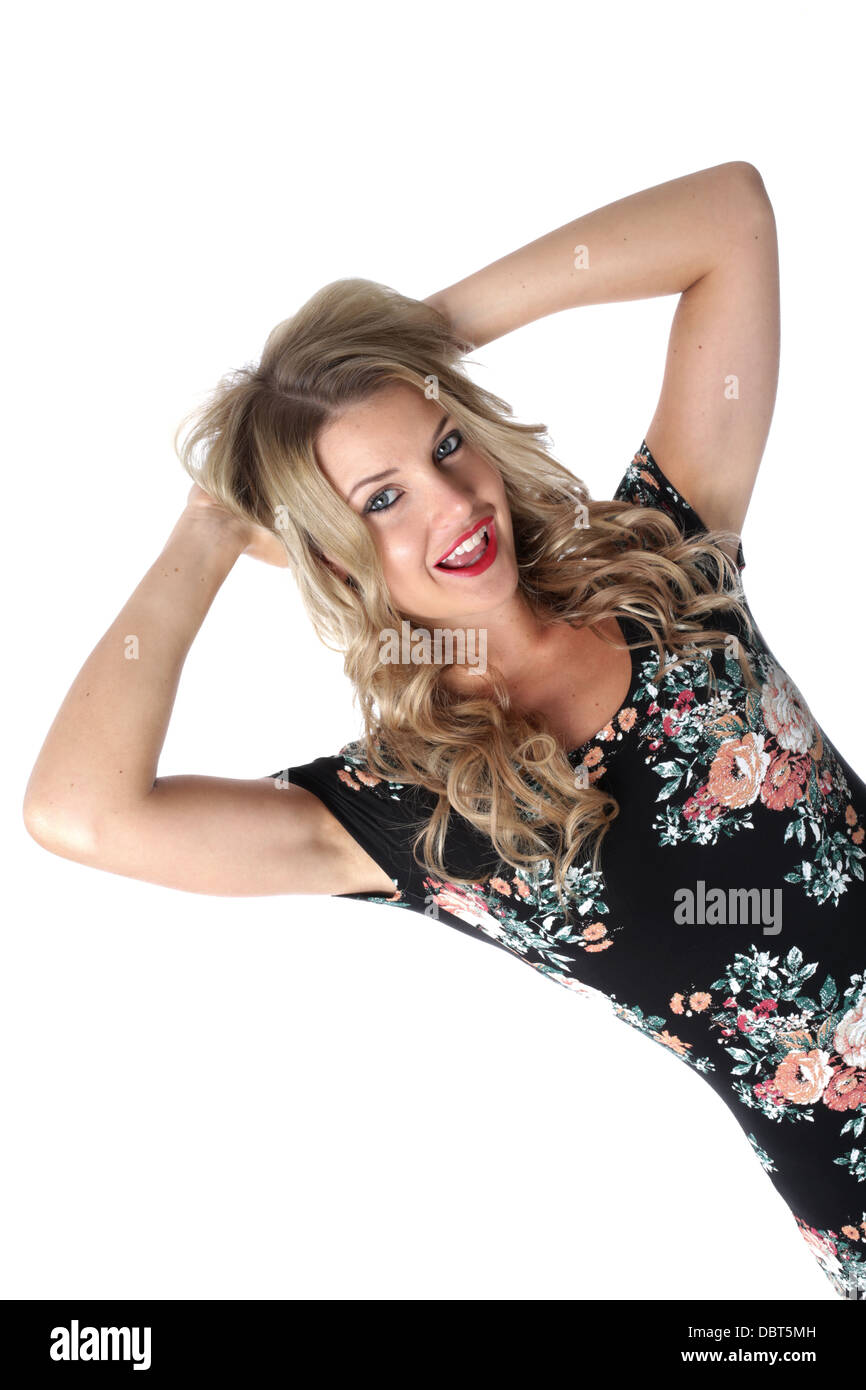 Modello rilasciato. Felice giovane donna le mani sulla testa Foto Stock