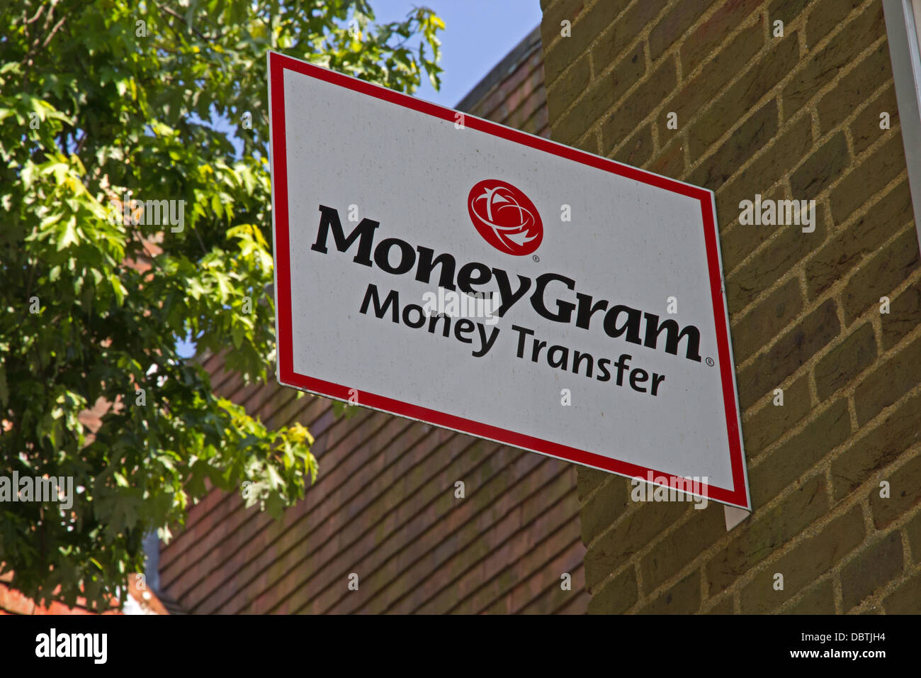 MoneyGram per il trasferimento di denaro al di fuori del segno shop Foto Stock