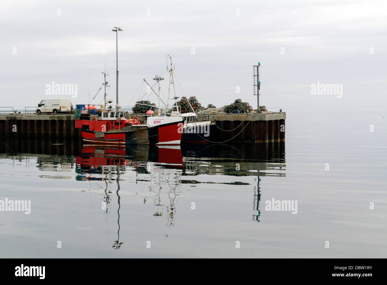 Barche da pesca sul orkney Foto Stock