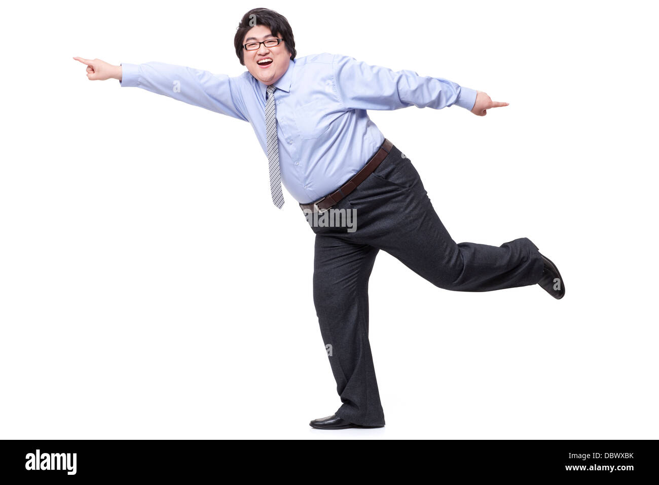 Eccitato imprenditore sovrappeso rivolto in avanti Foto Stock