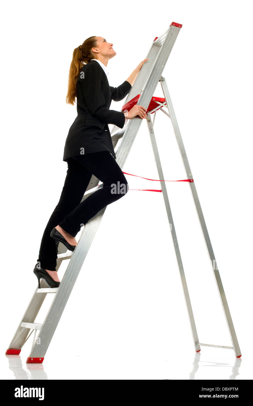 Giovane imprenditrice su una scala su sfondo bianco studio Foto Stock