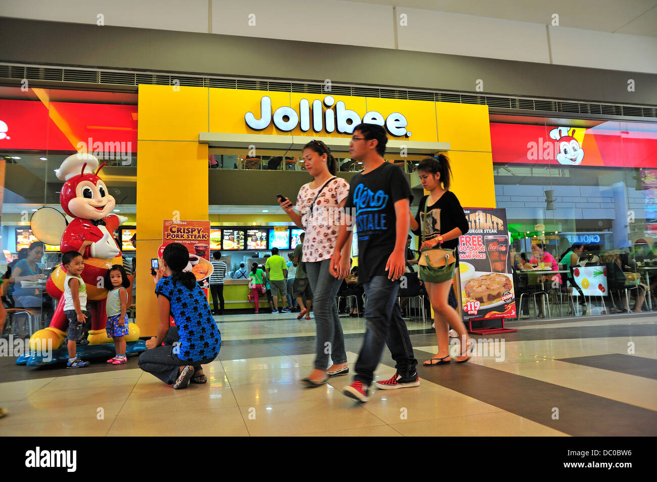 Jollibee Ristorante Fast Food SM City Mall di Cebu. Più grande il Fast Food Outlet nelle Filippine con oltre 10.000 dipendenti Foto Stock