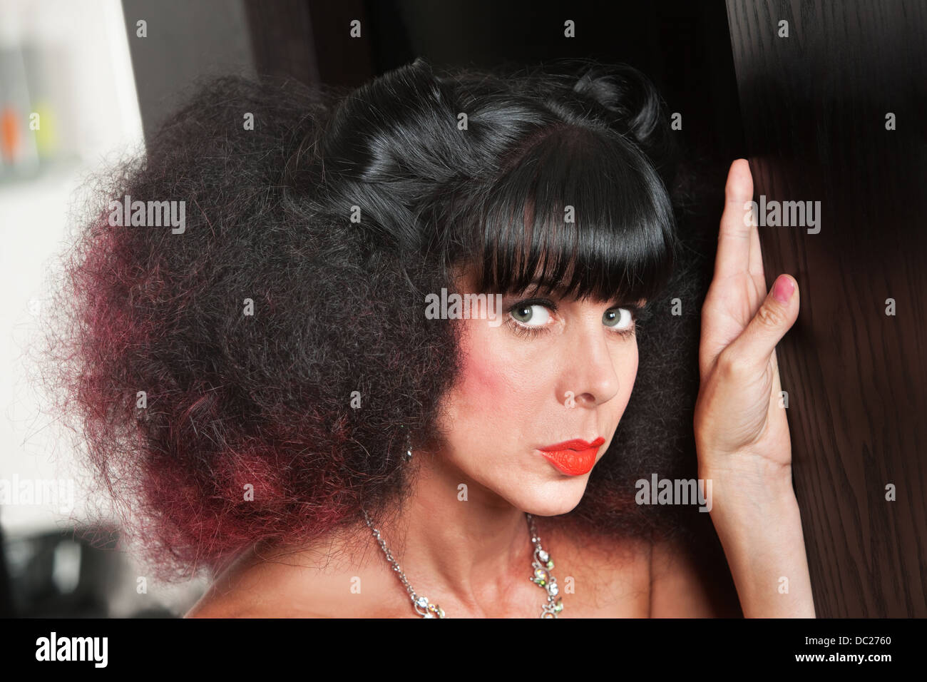 White donna con capelli crespi Foto Stock