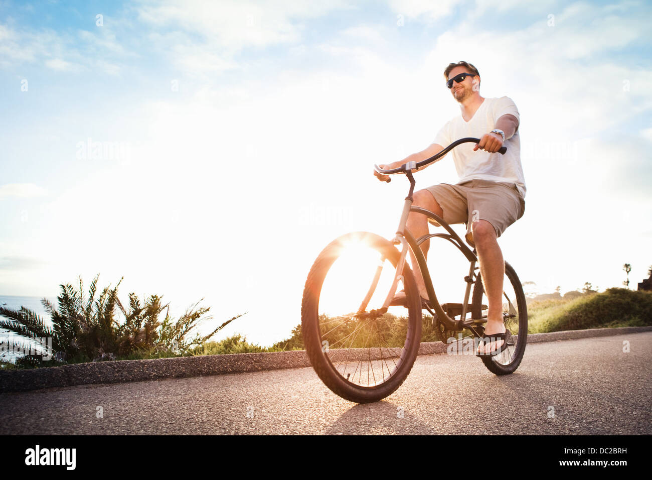 Uomo sulla bicicletta Foto Stock