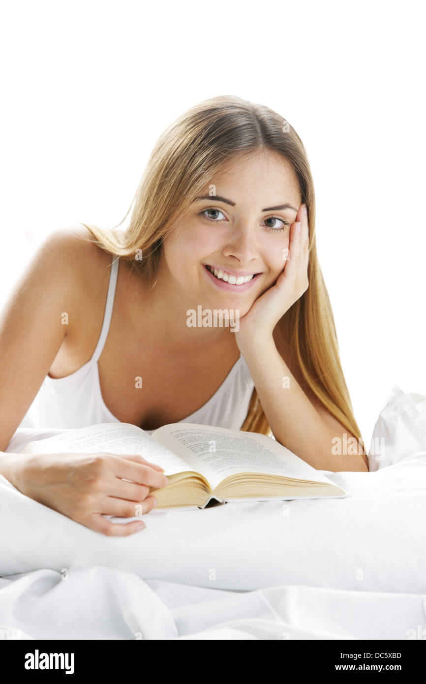 Leggere a letto Foto Stock