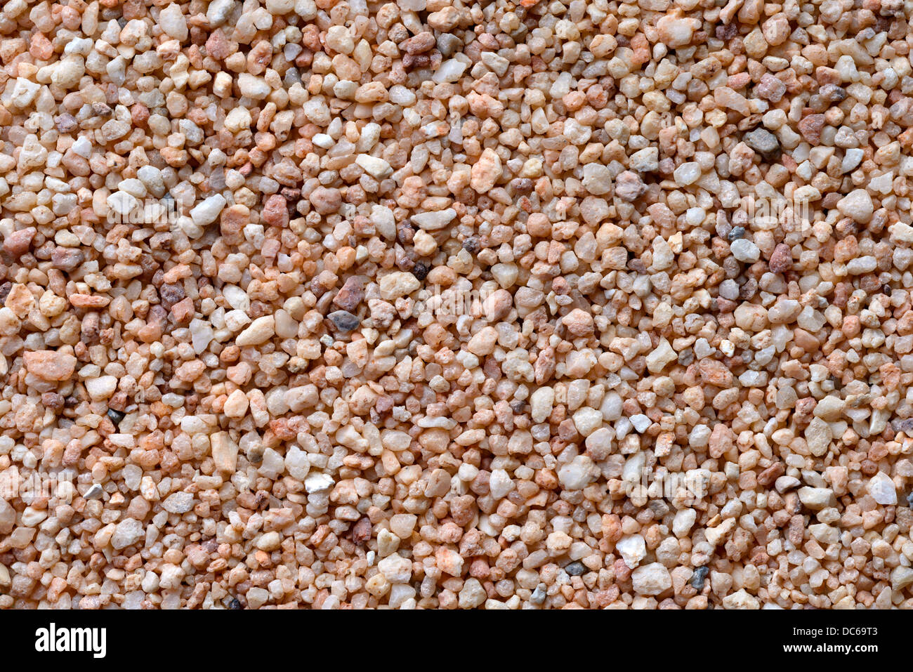 Gli sfondi e texture: sabbia grossa superficie, close-up shot Foto Stock