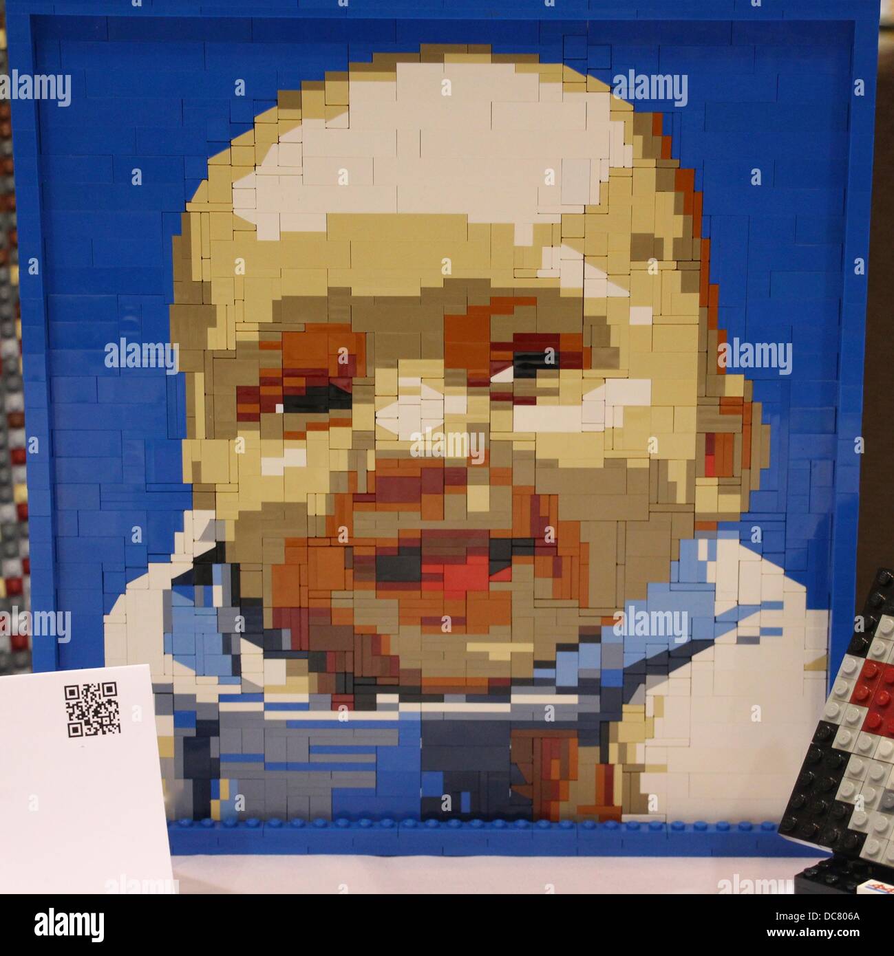 Santa Clara Convention Center, California USA 11 Agosto, 2013 mattoni dalla baia annuale convenzione Lego promuove la creatività. Baby Colby da Mariann Asanuma. Il mosaico di Lego è una foto di Mariann amico di Tiffany's baby Colby. Agosto 11, 2013 Credit: Lisa Werner/Alamy Live News Foto Stock