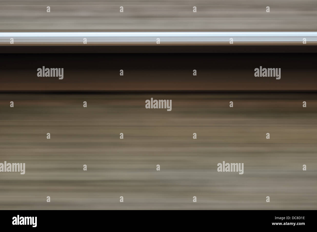 Abstract rotaia singola in motion blur ferroviari veloci Foto Stock