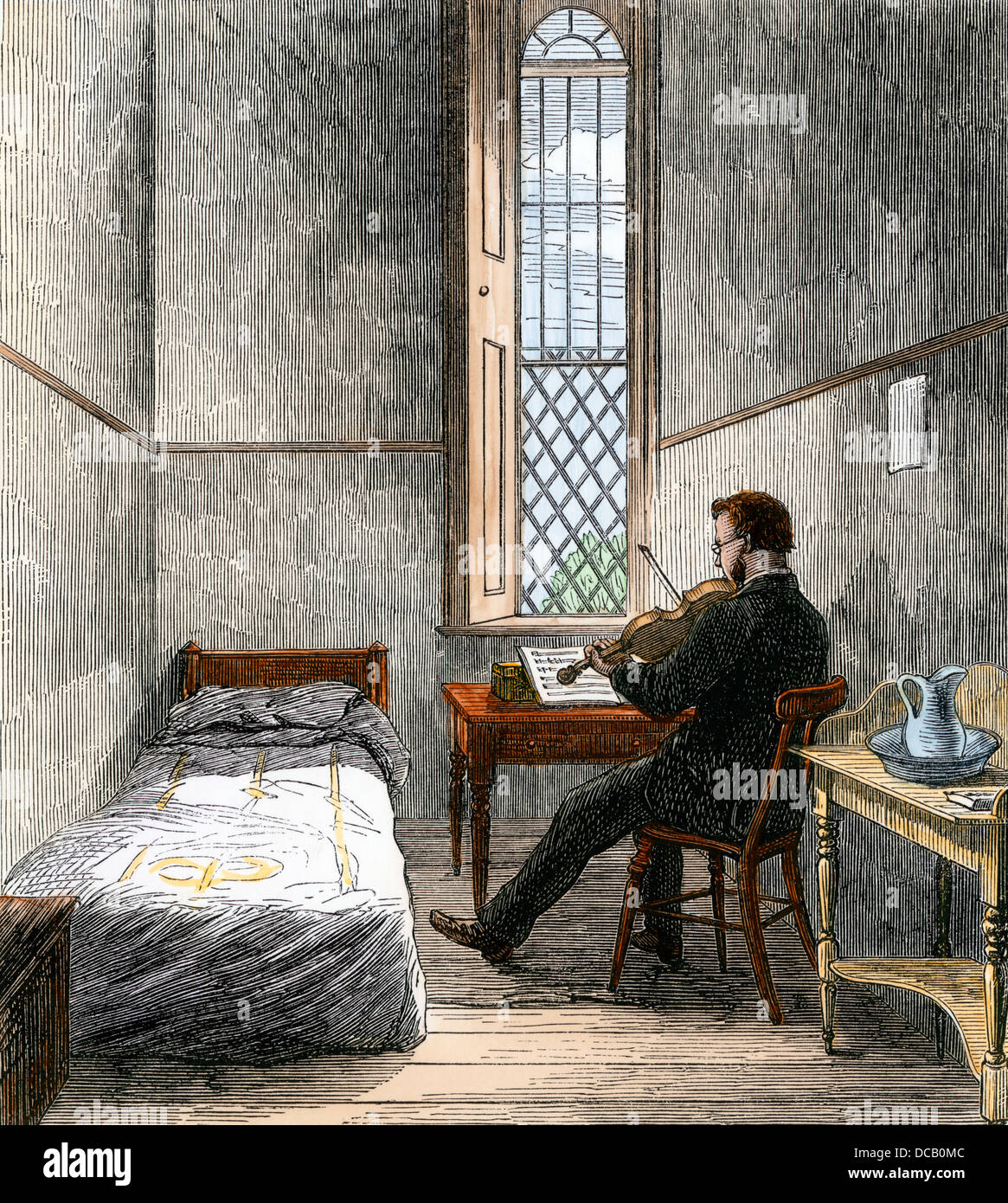 Paziente a suonare il violino in dormitorio maschile, Broadmoor criminale manicomio, Londra, 1860s. Colorate a mano la xilografia Foto Stock