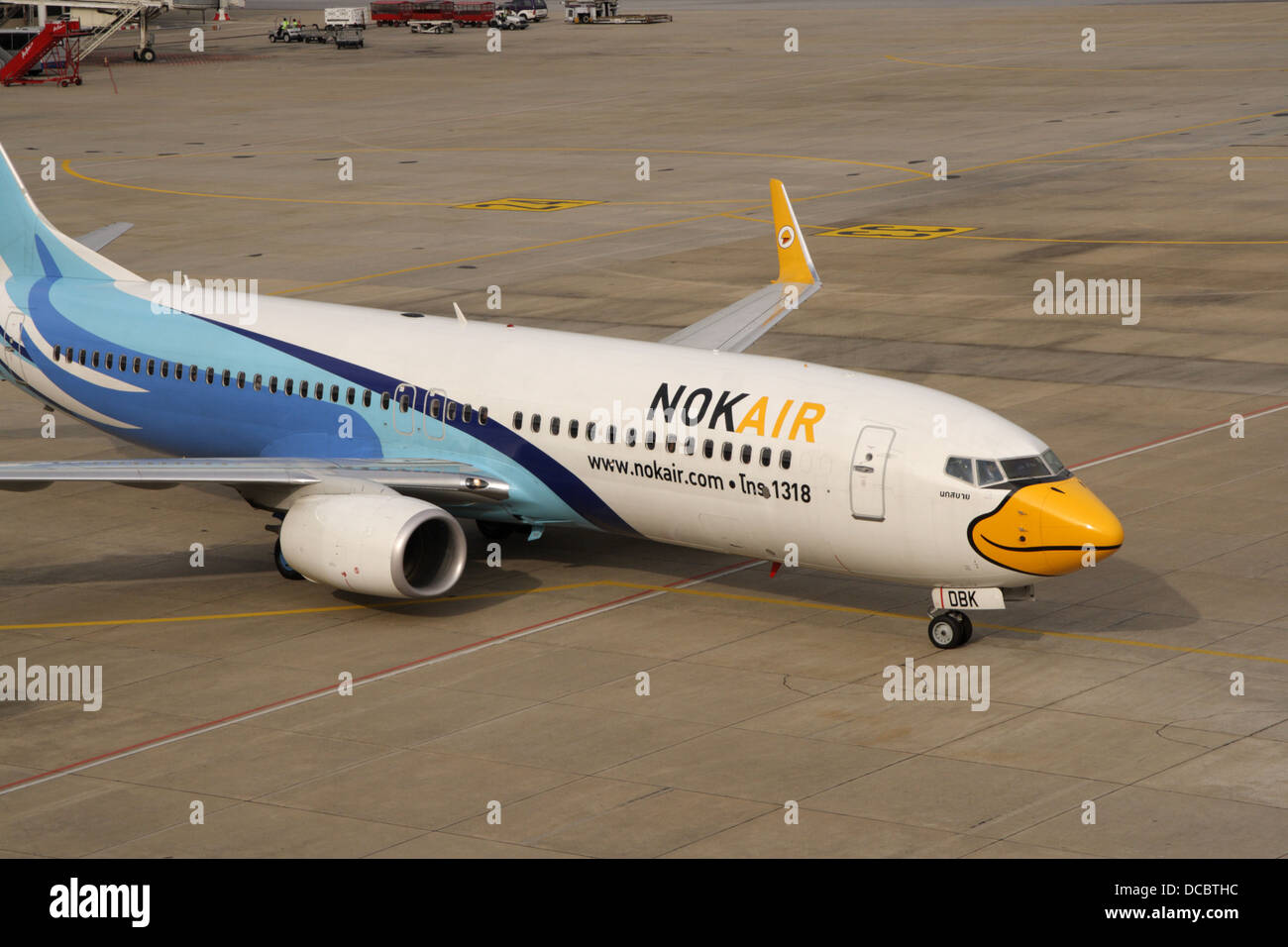 Compagnia aerea a basso costo Nok Air parcheggio presso l'aeroporto di Don Muang Foto Stock