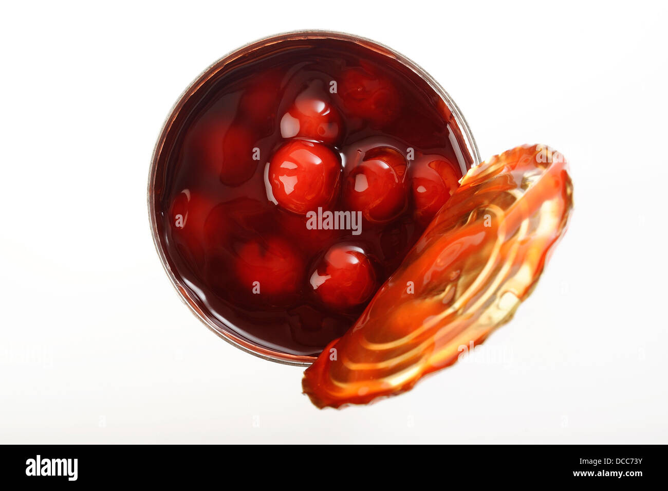 Rosso rubino ciliegia in lattine per topping torta Foto Stock