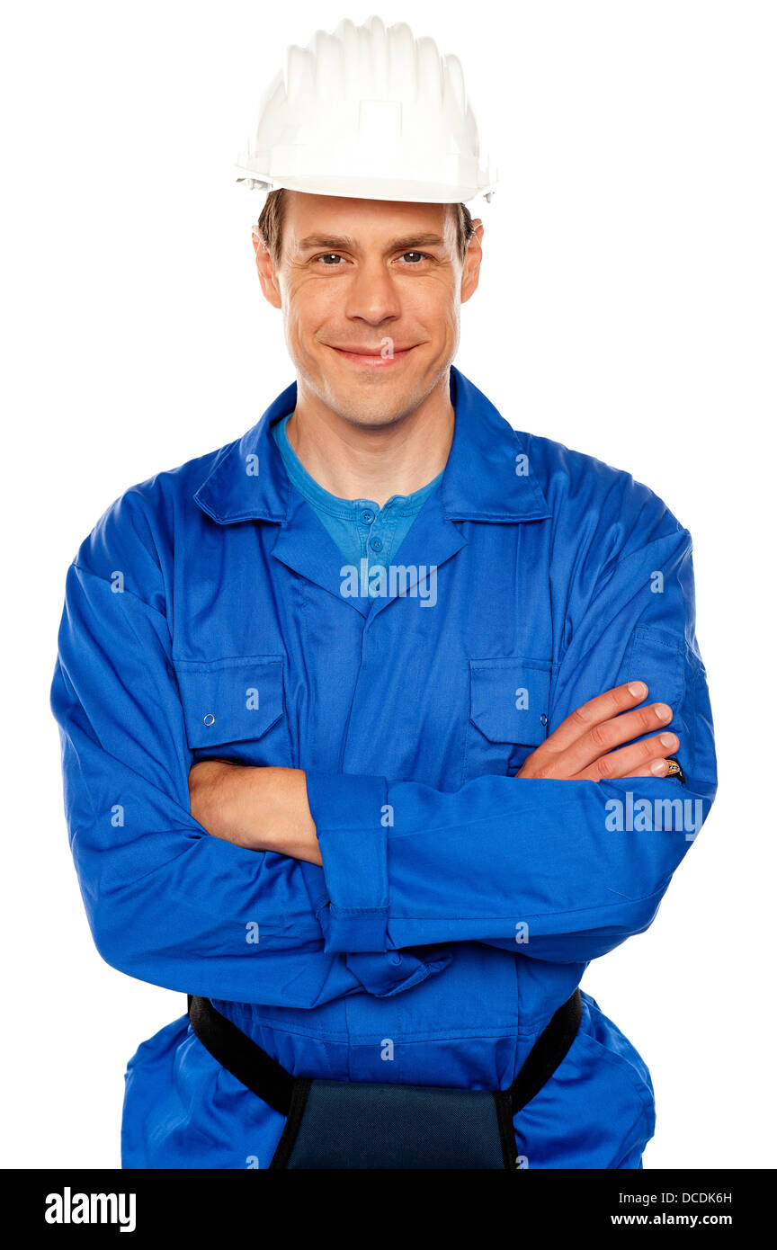 Isolato giovani attraenti repairman in posa con stile Foto Stock