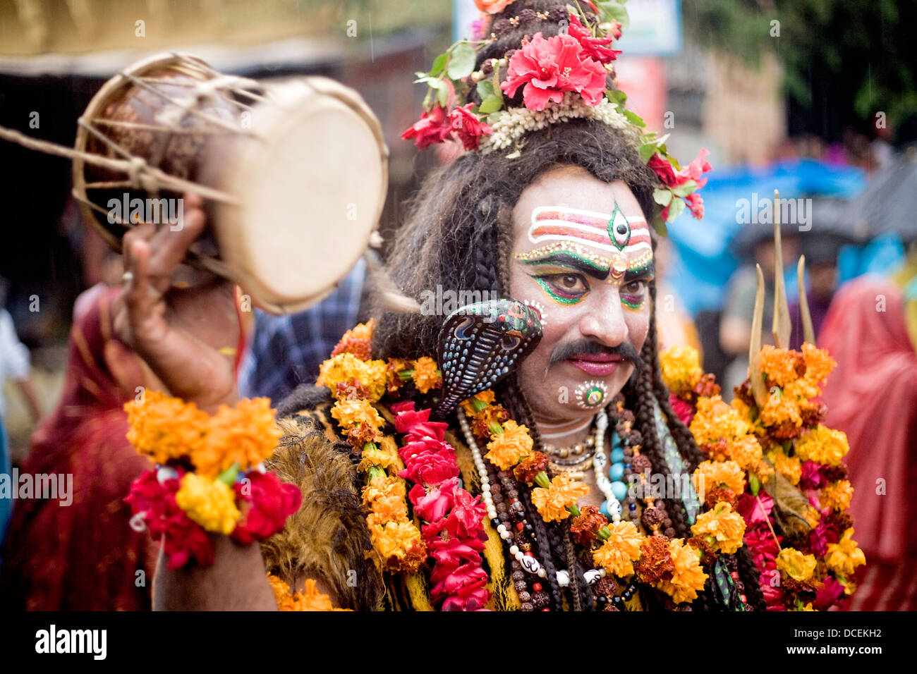 Indian artista locale come il dio Shiva al festival di Pushkar , India Foto Stock