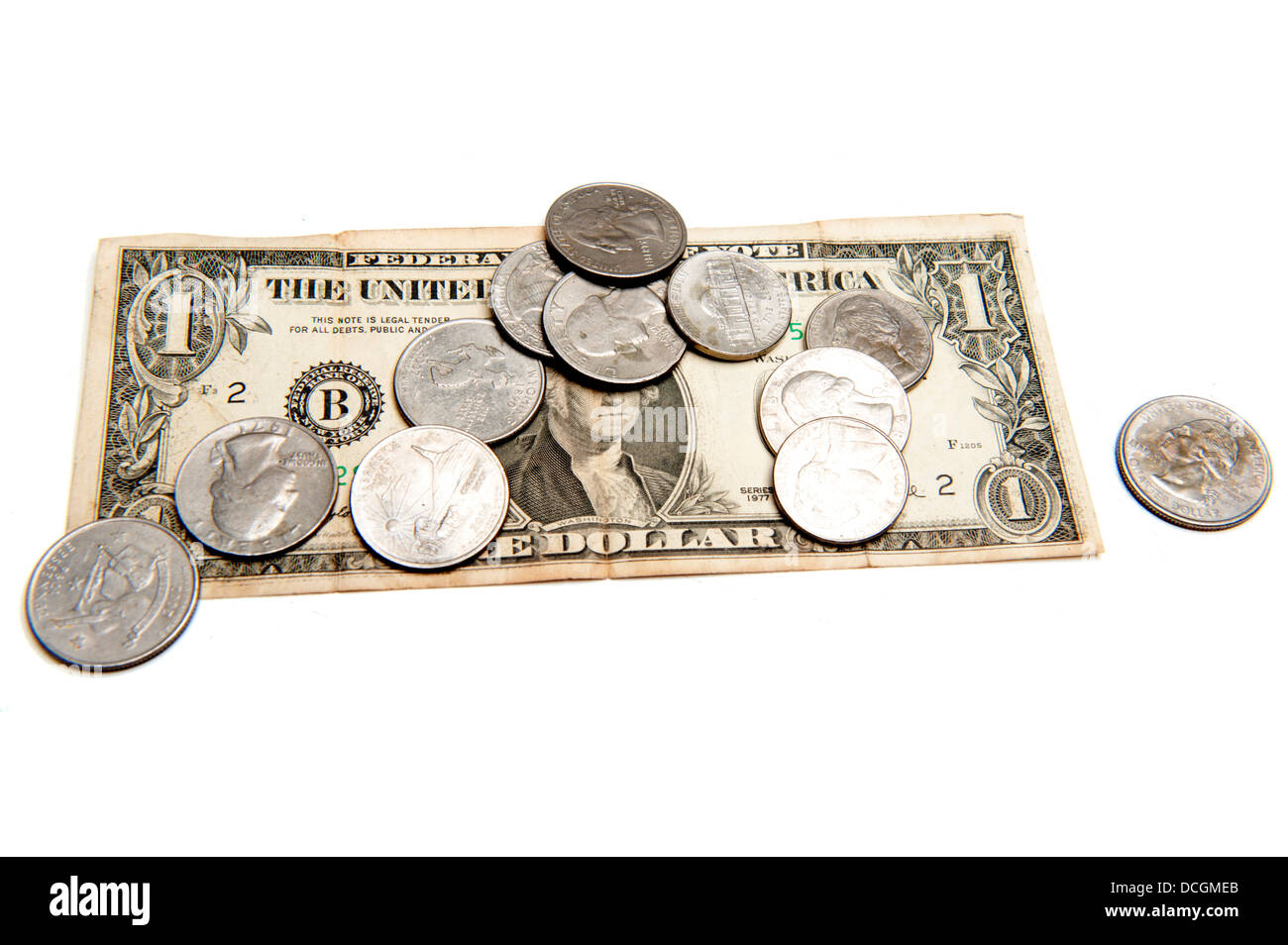 Valuta del dollaro e delle monete su bianco . Foto Stock