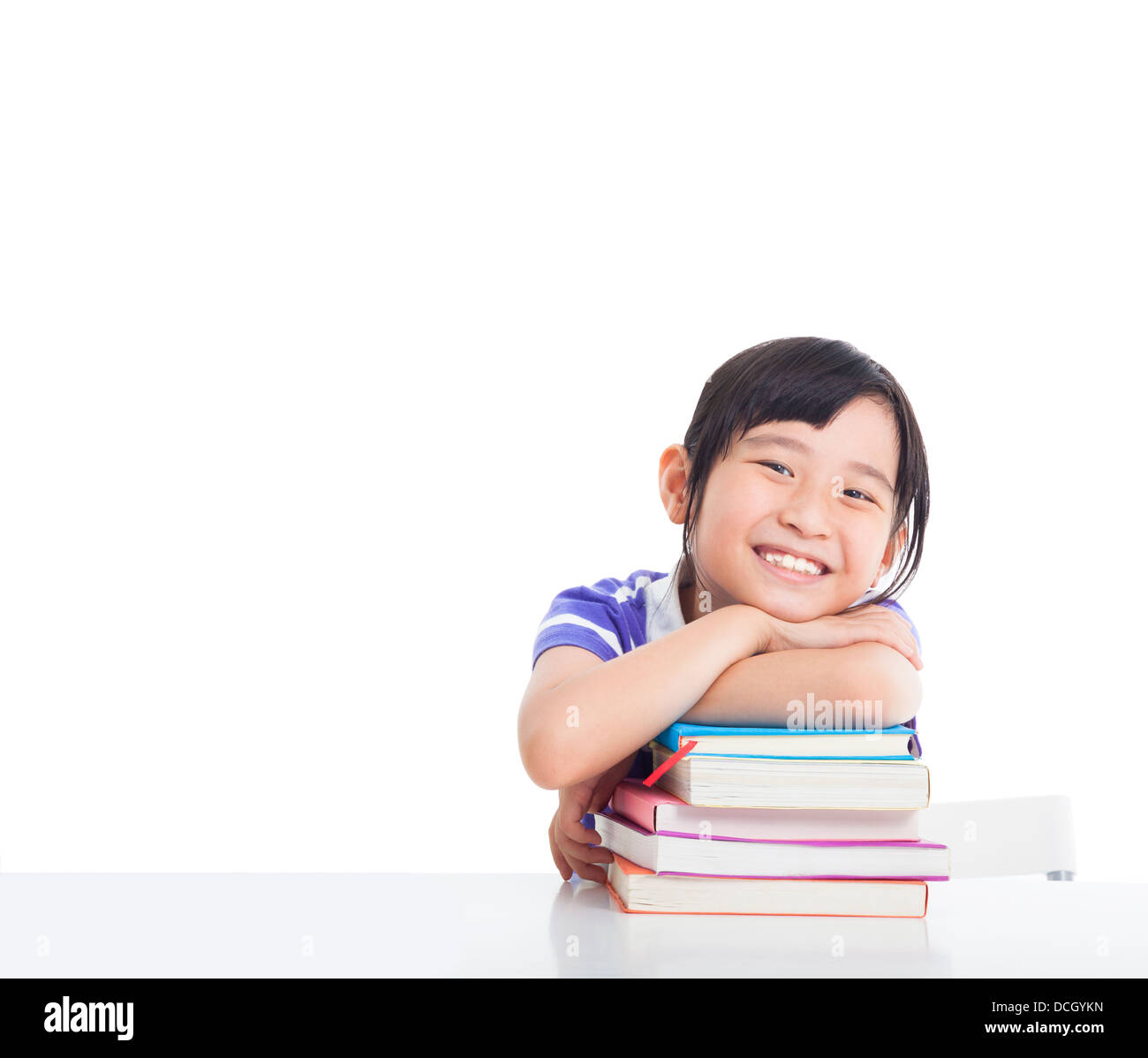 Felice bambina con libri Foto Stock