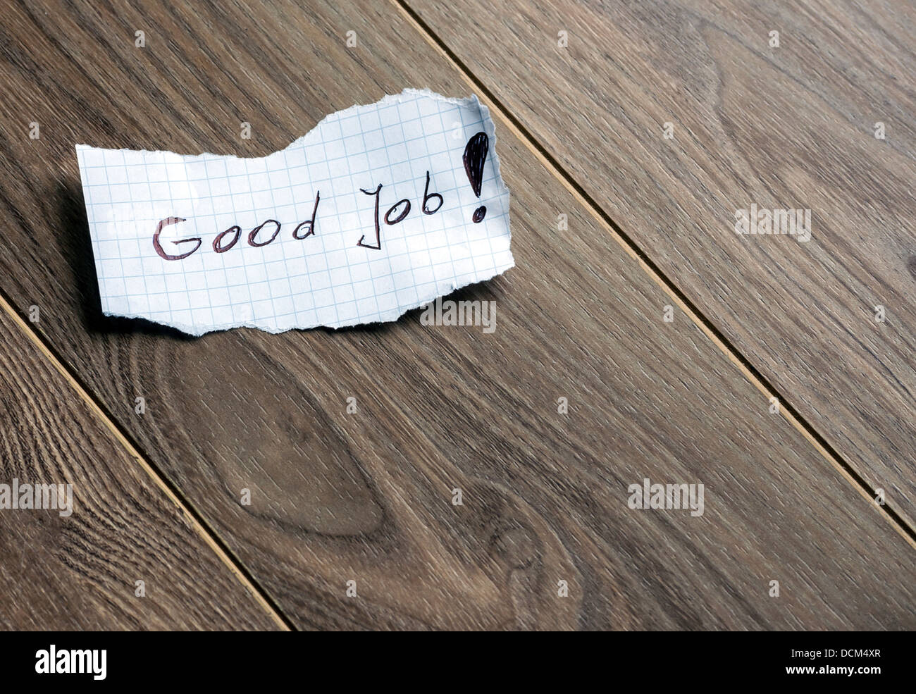 Buon Lavoro - La scrittura a mano il testo su uno sfondo di legno con spazio per il testo Foto Stock