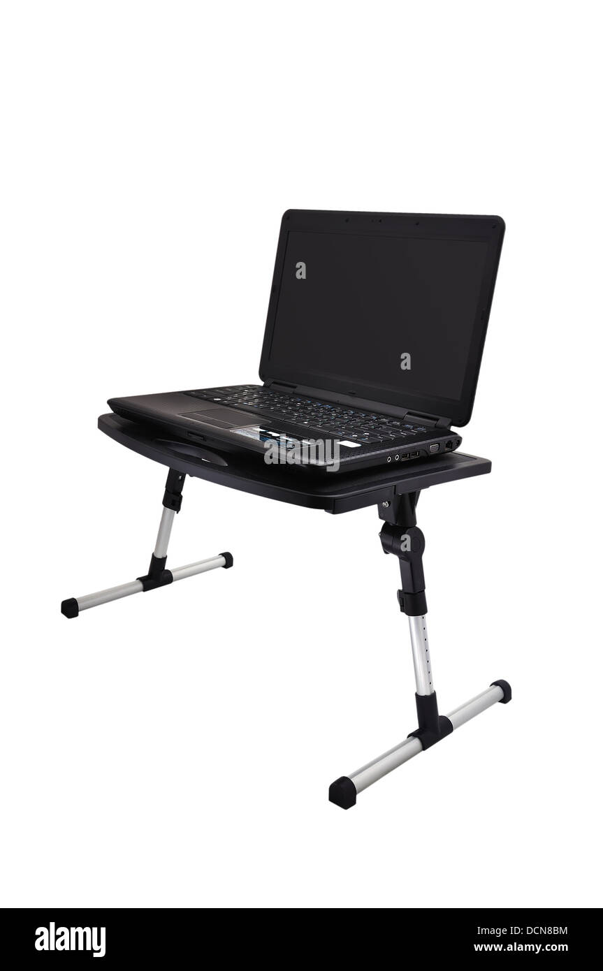 Sul computer portatile sul tavolo pieghevole Foto Stock