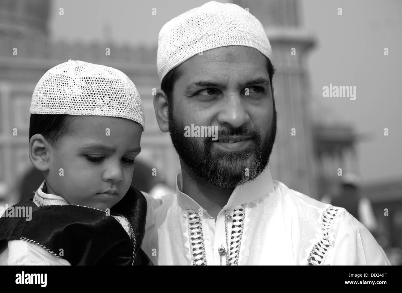 Musulmani, padre e figlio, la preghiera, la Jama Masjid, Islam, la religione,Vecchia Delhi, India Foto Stock