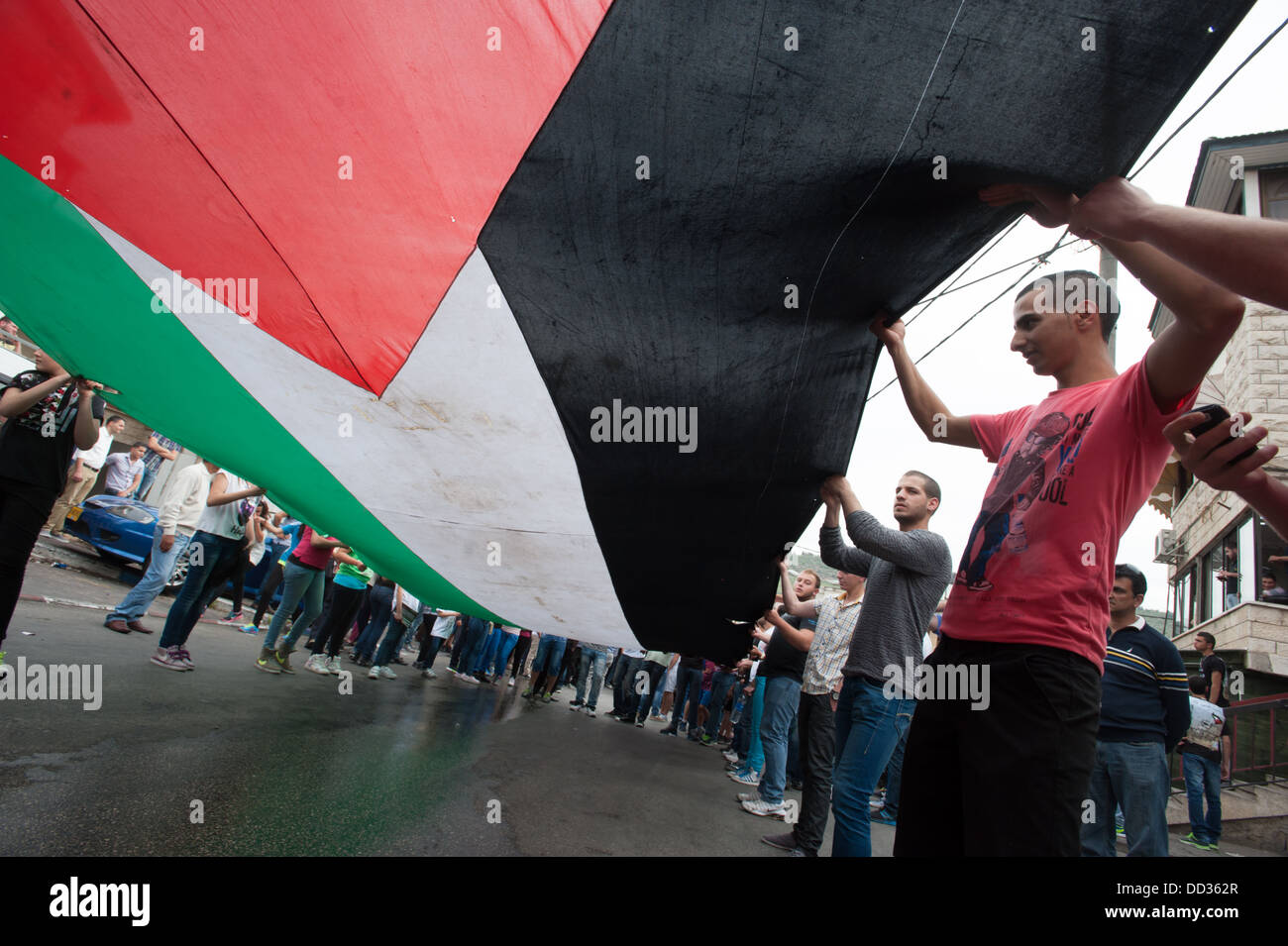 Gioventù palestinese dalla Galilea città di Sakhnin marzo durante un giorno di terra di dimostrazione. Foto Stock