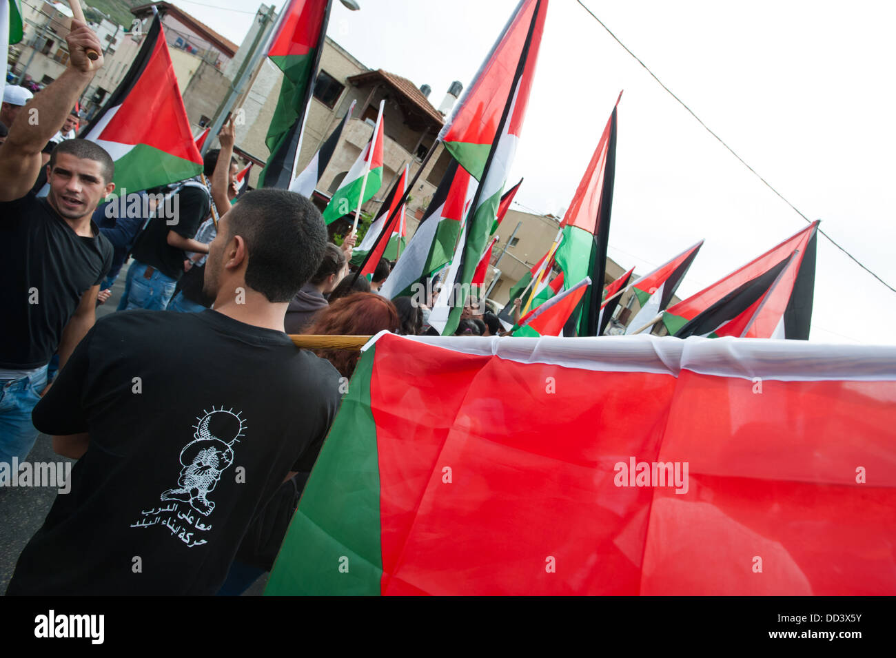 Gioventù palestinese dalla Galilea città di Sakhnin marzo durante un giorno di terra di dimostrazione. Foto Stock