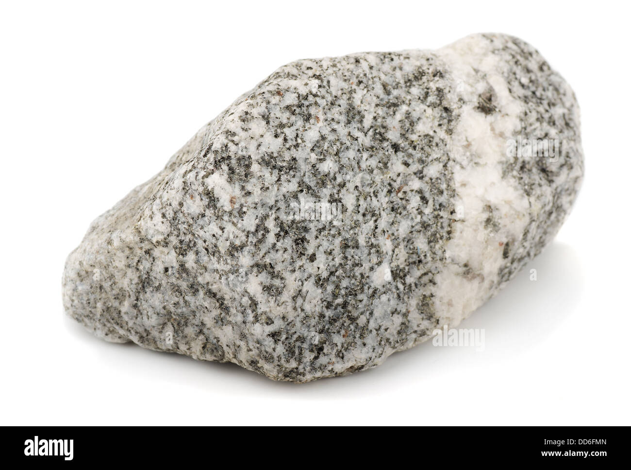 Roccia di granito isolato su bianco Foto Stock