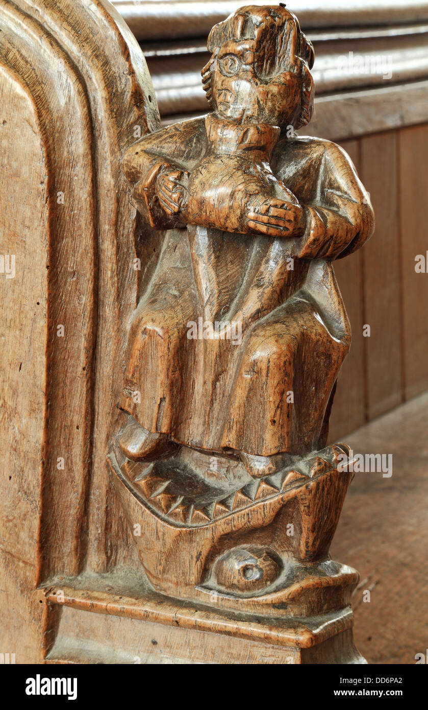 Thornham, Norfolk, xv secolo intaglio del legno, England Regno Unito, sculture in legno benchends benchend fine, ubriachezza, 7 peccati capitali Foto Stock