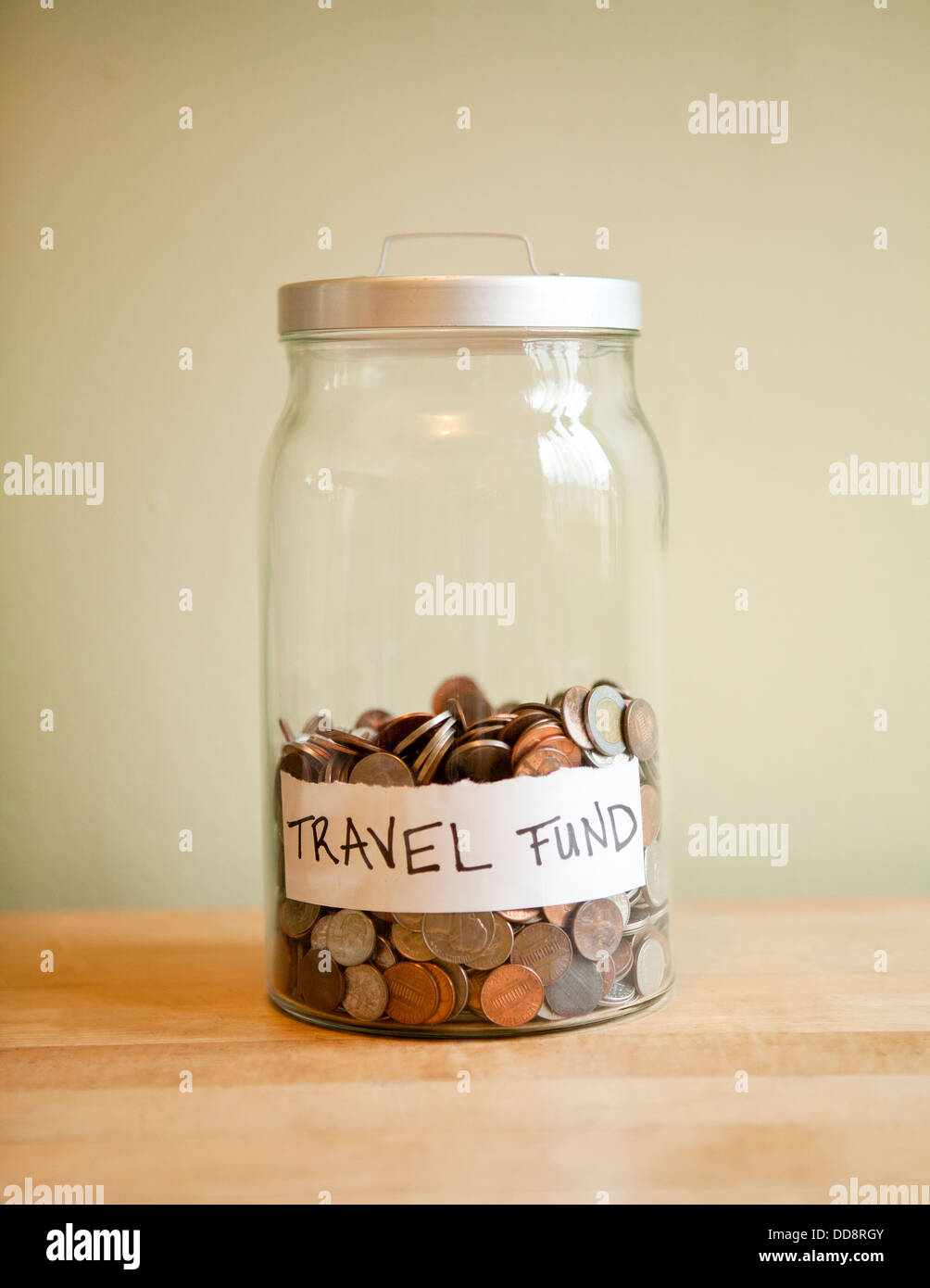 Monete in 'travel fondo " jar Foto Stock