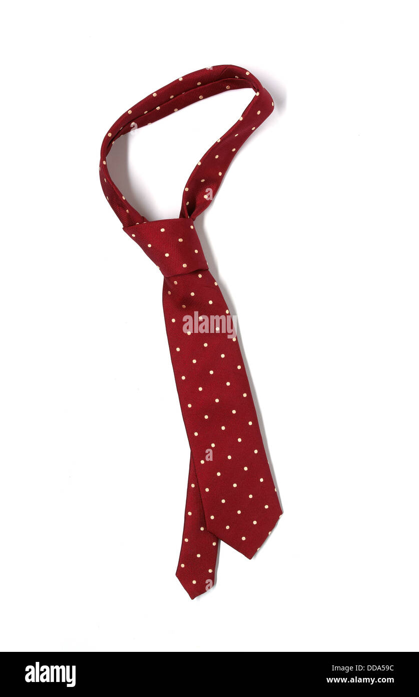 Rosso a macchie tie, ritagliata su sfondo bianco Foto Stock
