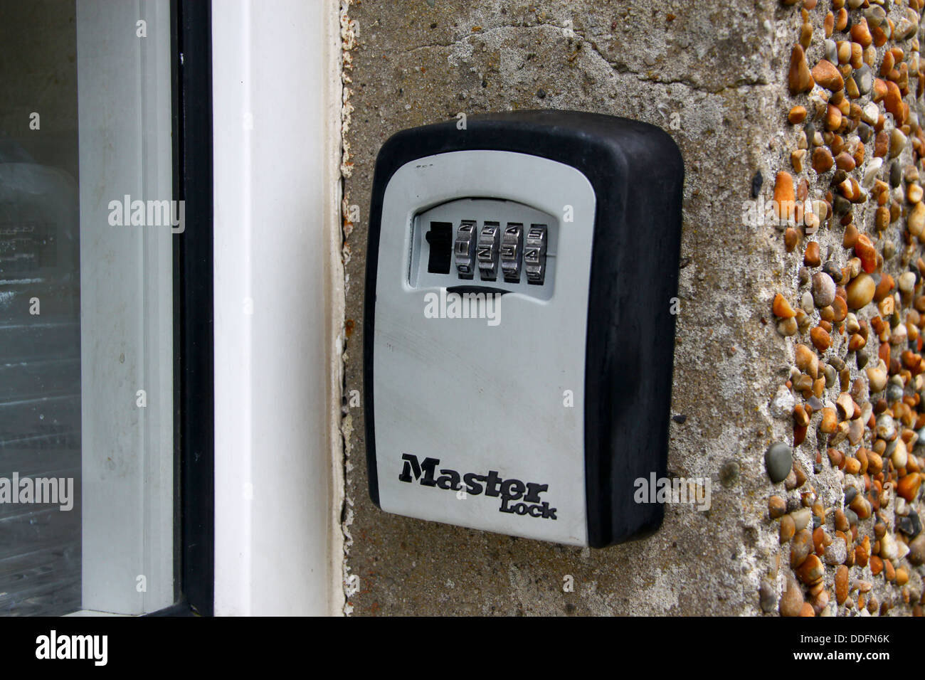 Chiave esterna cassetta di sicurezza sulla parete edilizia Foto Stock