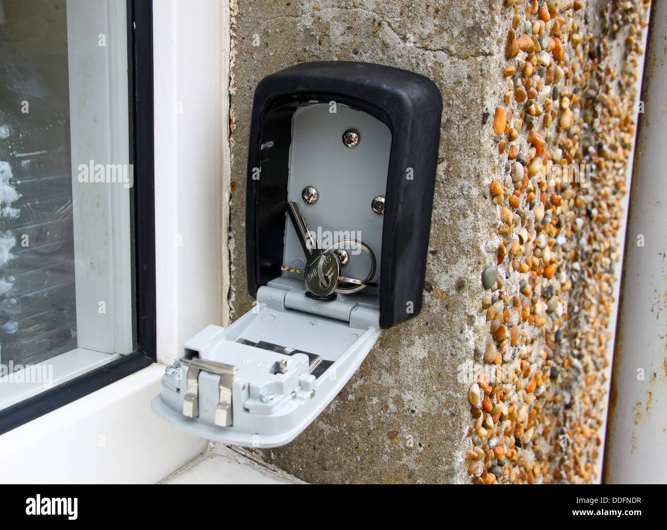 Chiave esterna cassetta di sicurezza sulla parete edilizia Foto Stock