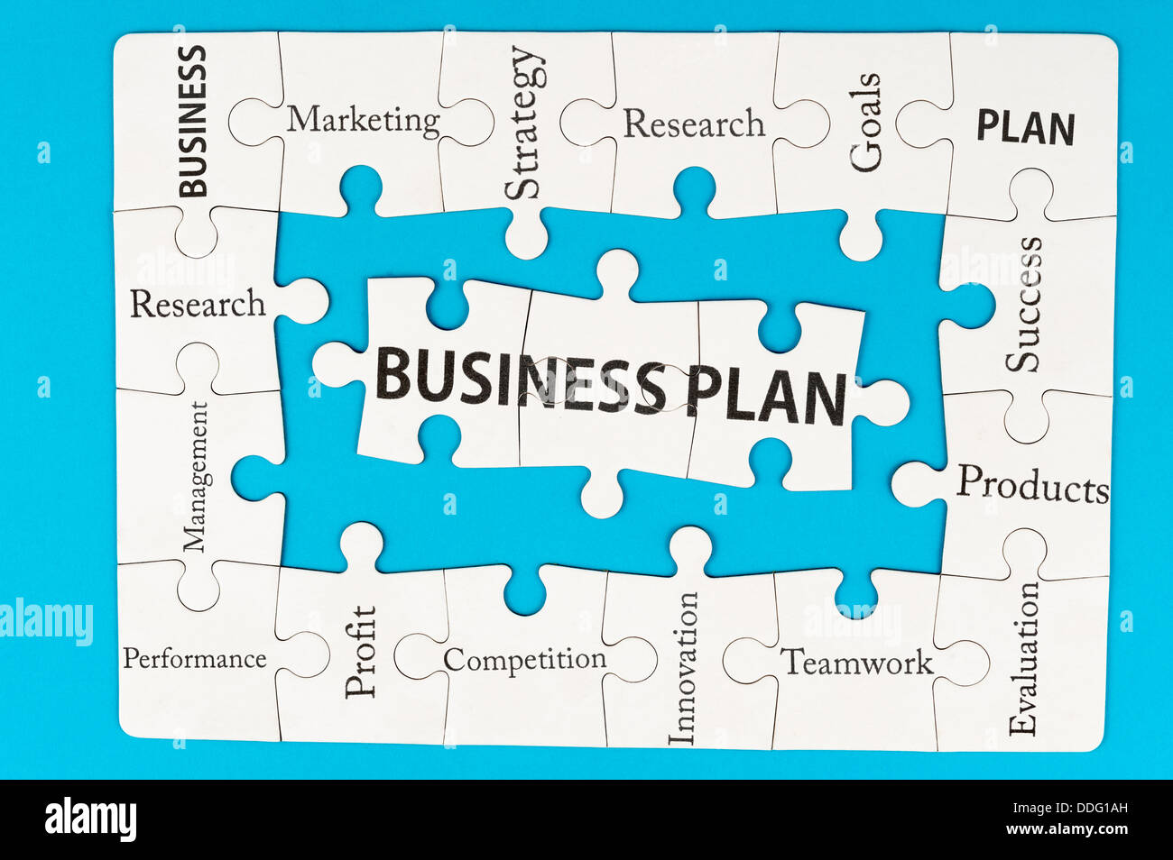 Business plan concept parole sul gruppo di puzzle di pezzi Foto Stock