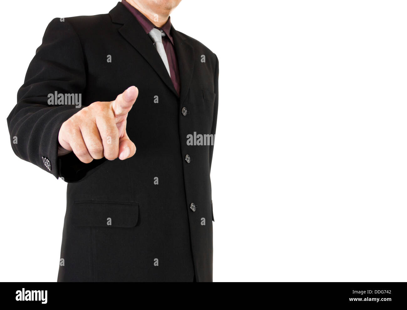 Business man spingendo su una interfaccia touch-screen Foto Stock