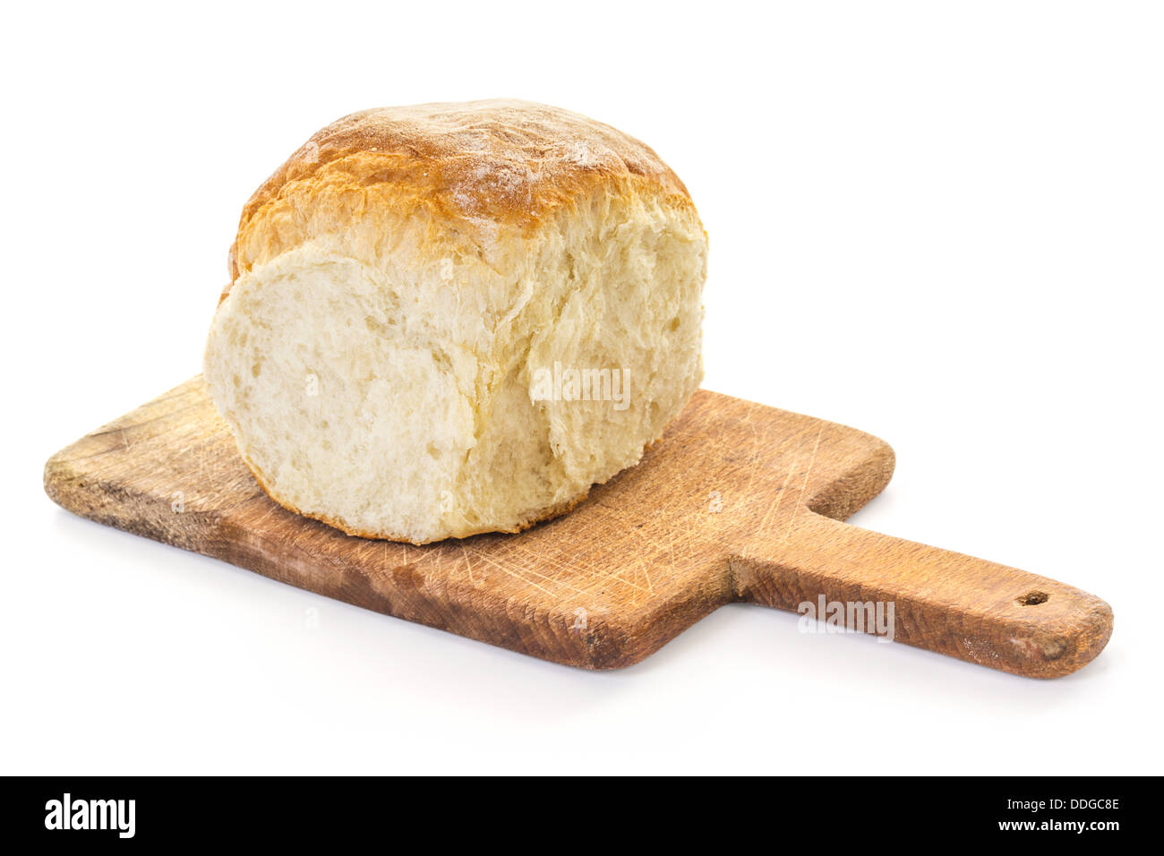 Un quarto di quattro ciambelle di pane vecchio sul tagliere, chiave di elevata Foto Stock