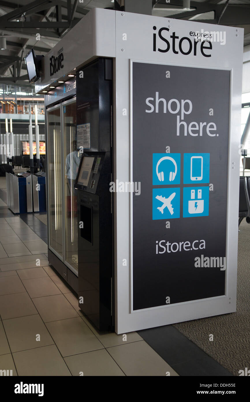 IStore Express macchina distributrice all'aeroporto con Apple Elettronica e accessori Foto Stock