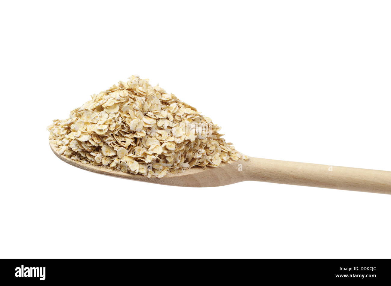 Oat flake sul cucchiaio di legno isolato su bianco Foto Stock