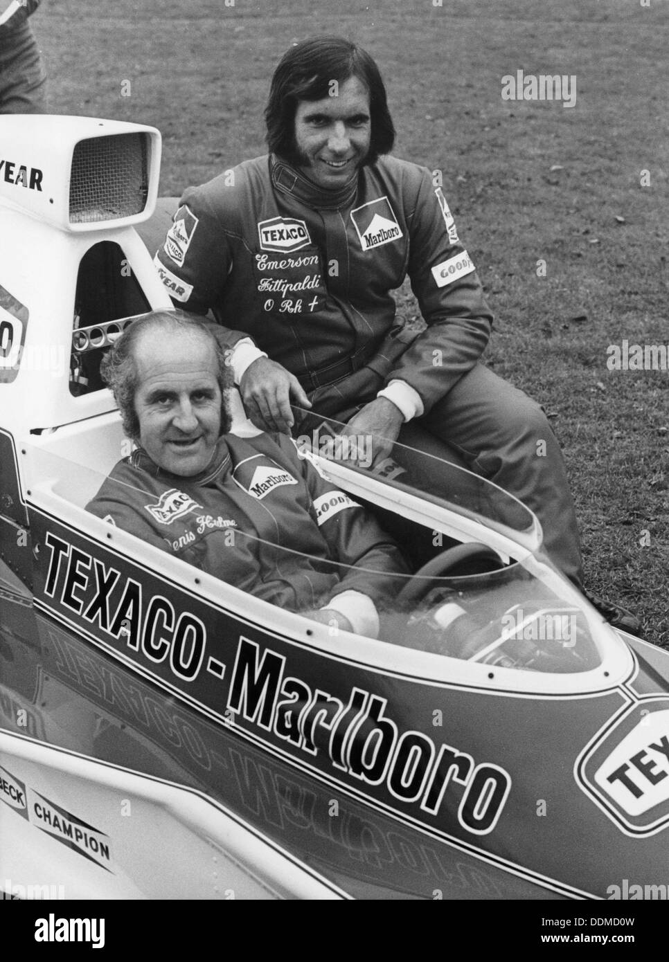 Denny Hulme ed Emerson Fittipaldi, 1974. Artista: sconosciuto Foto Stock