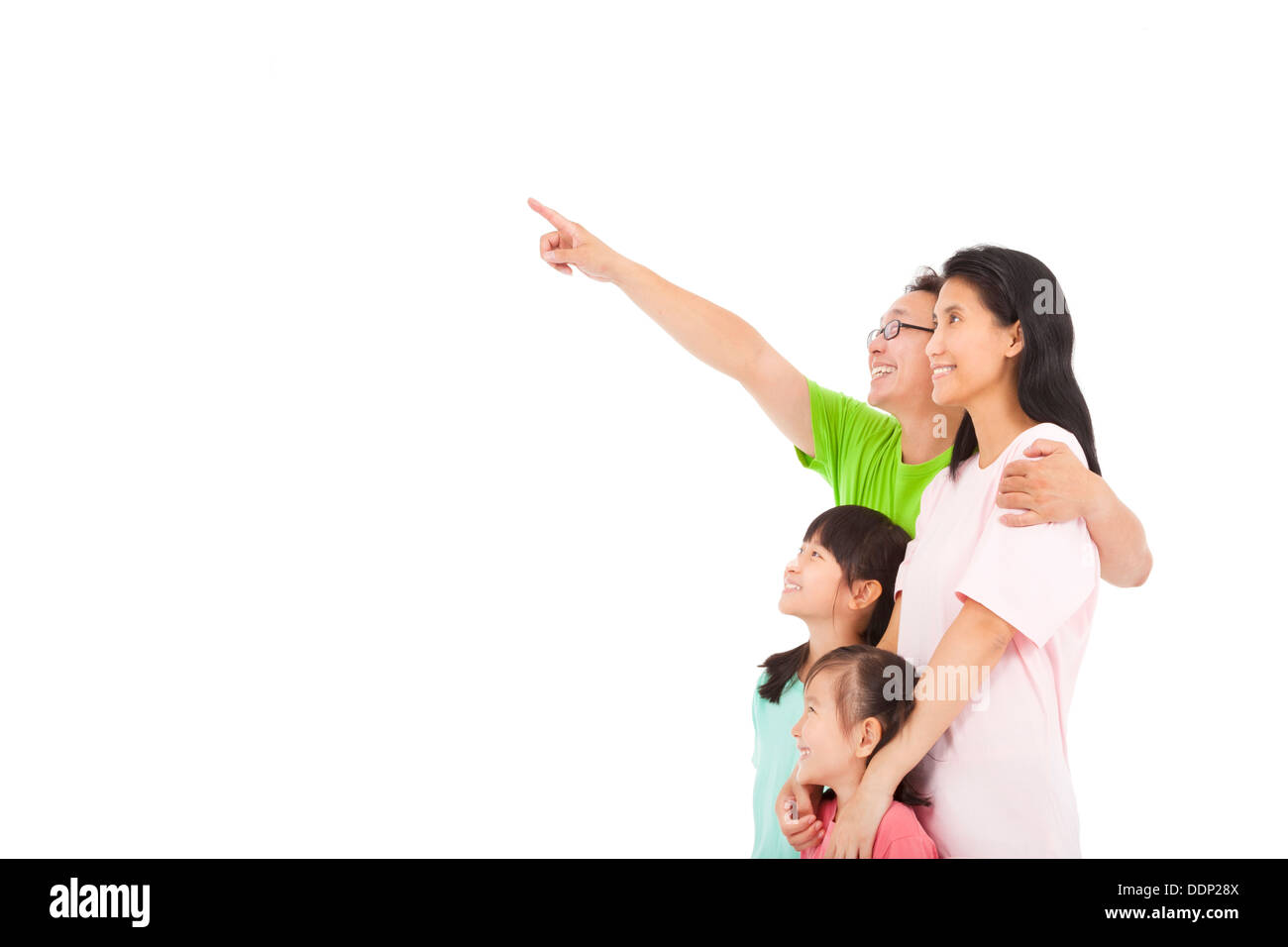 La famiglia felice alla ricerca e puntamento Foto Stock