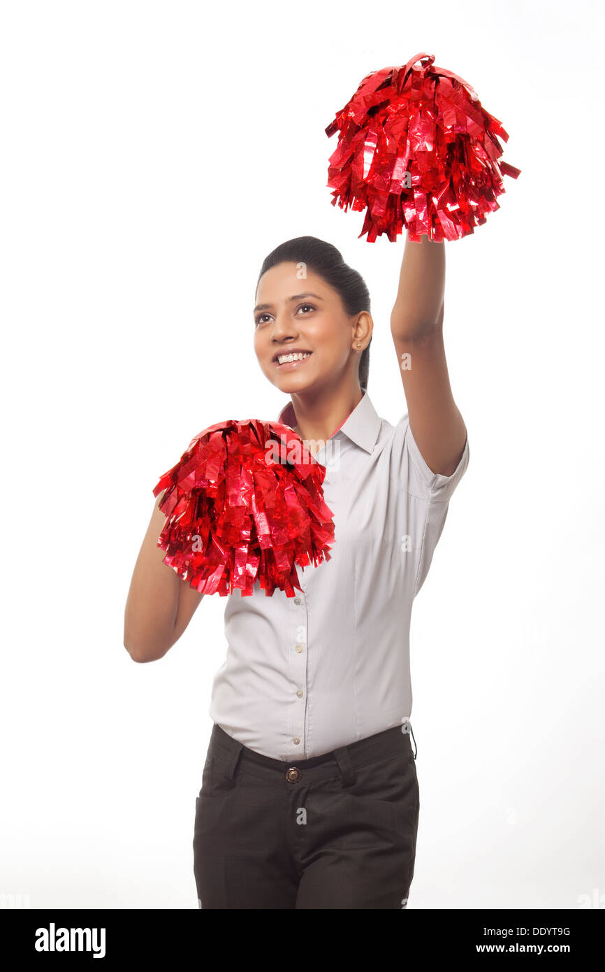 Happy cheer leader con pompon isolate su sfondo bianco Foto Stock