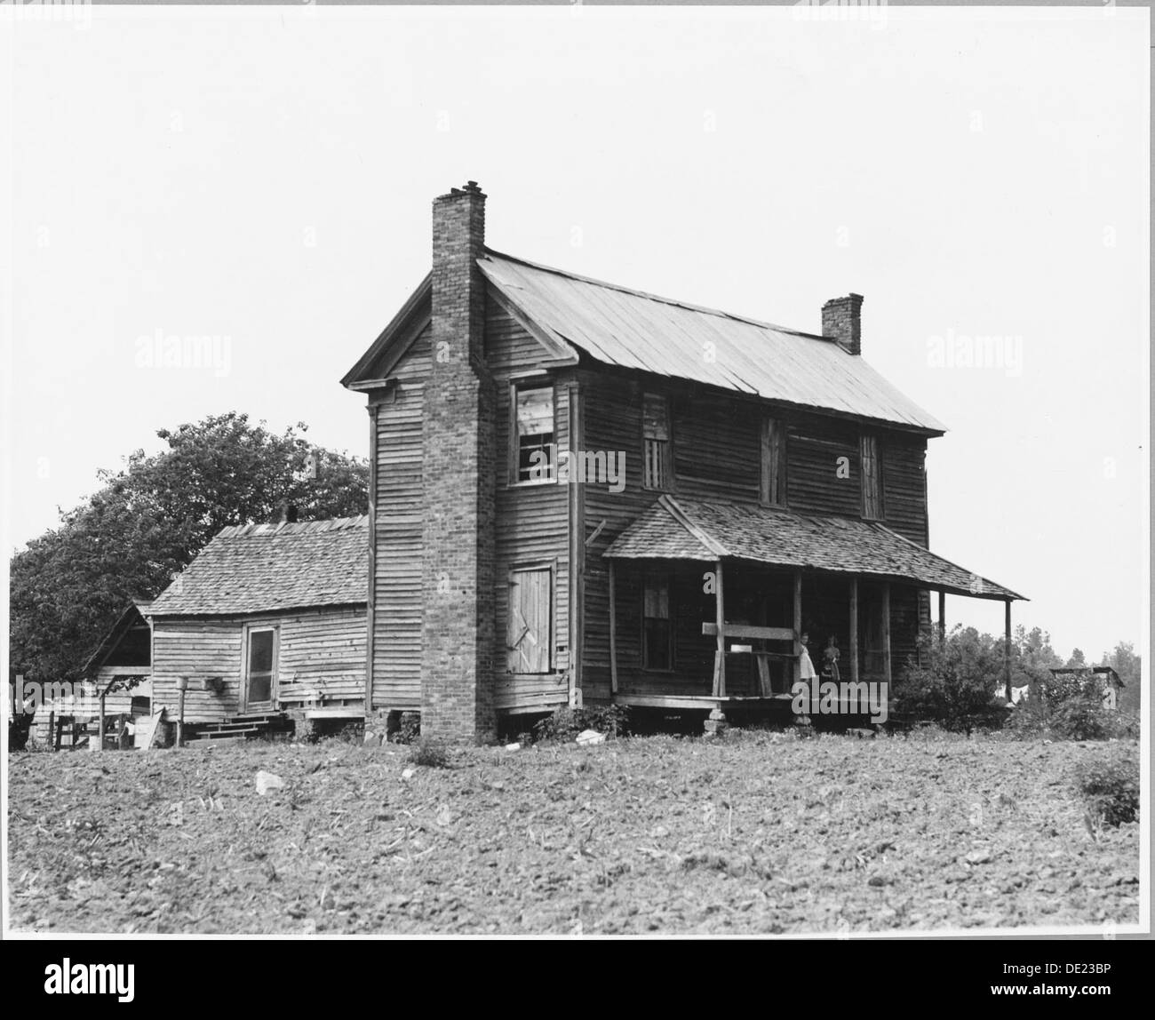 Due famiglie di inquilini bianchi sono ritratti nella Harmony Community, Putnam County, Georgia, come nuovi arrivi in questa zona rurale durante l'inizio del XX secolo. Foto Stock