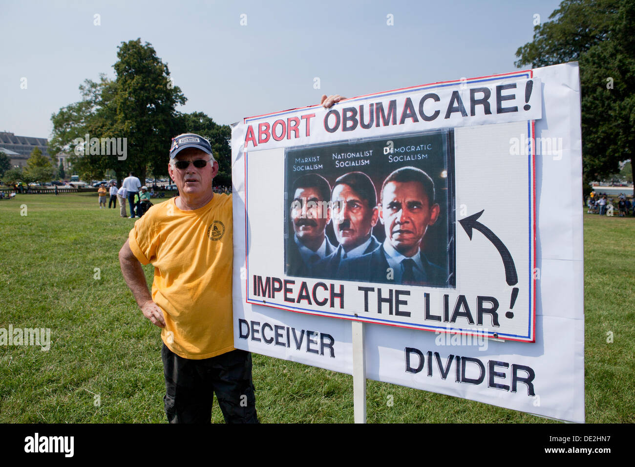 L'uomo azienda Anti-Obama segno - Washington DC, Stati Uniti d'America Foto Stock