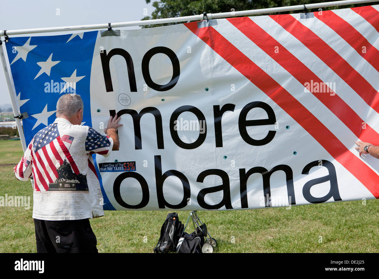 L'uomo azienda Anti-Obama banner - Washington DC, Stati Uniti d'America Foto Stock