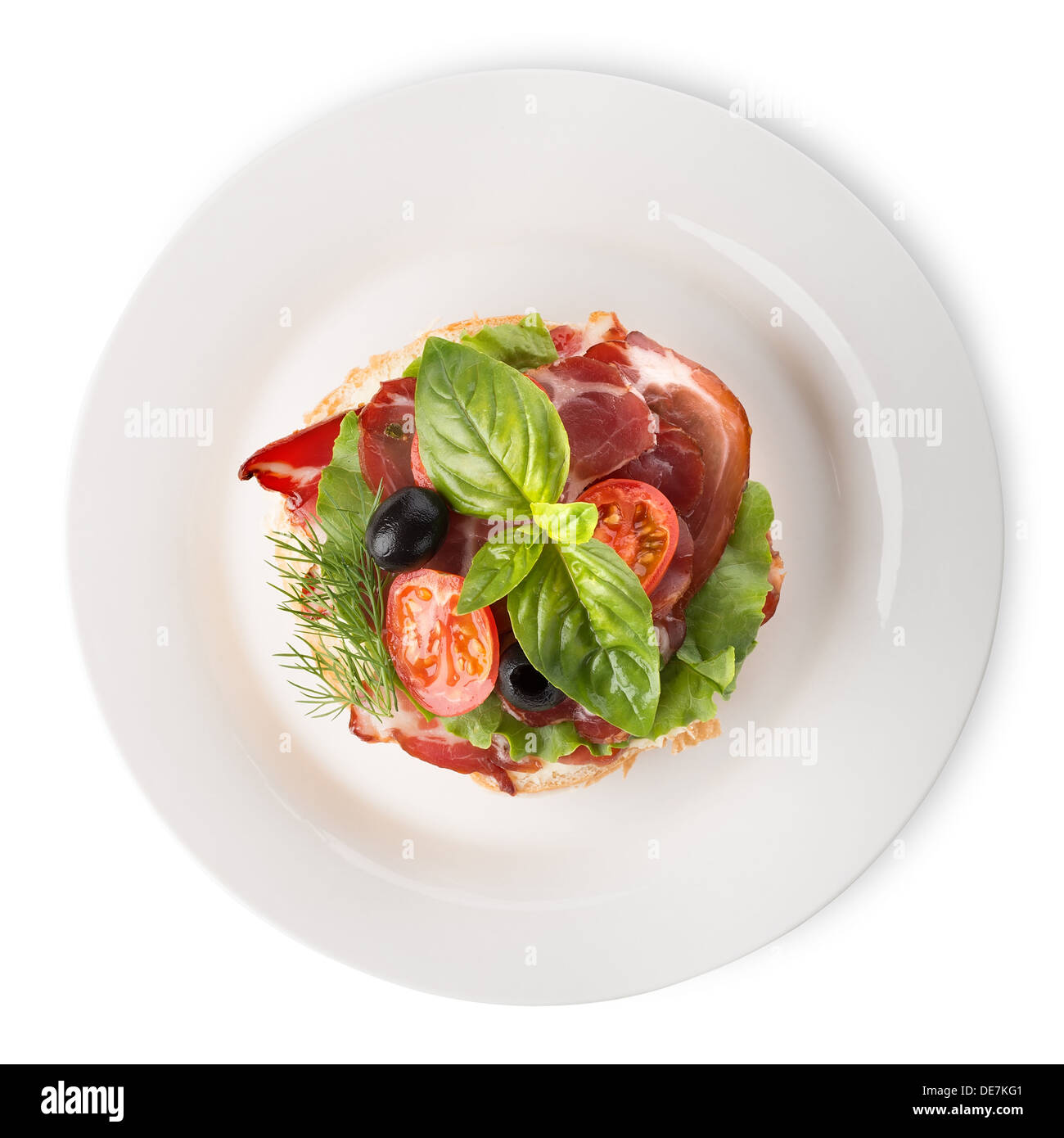 La pancetta con verdure e verdi nella piastra Foto Stock