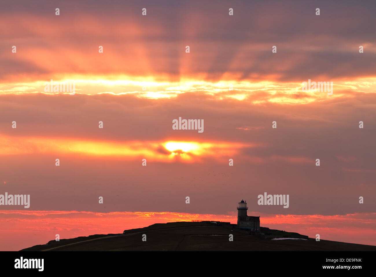 Il Belle Tout Lighthouse, East Sussex, Beachy Head durante il tramonto Foto Stock