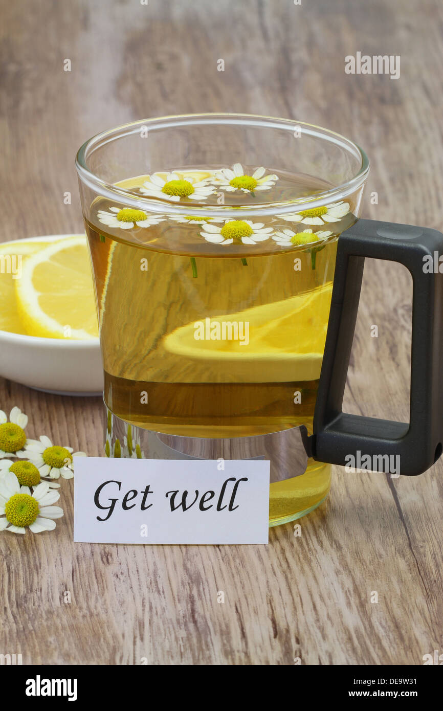 Ottenere ben nota, tè camomilla e limone fresco Foto Stock