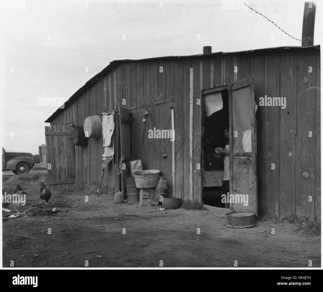 Questa immagine raffigura i quartieri messicani in un campo di coltivatori vicino a Buckeye, Maricopa County, Arizona, dove risiedono raccoglitori di cotone migratori durante le stagioni del raccolto. Foto Stock