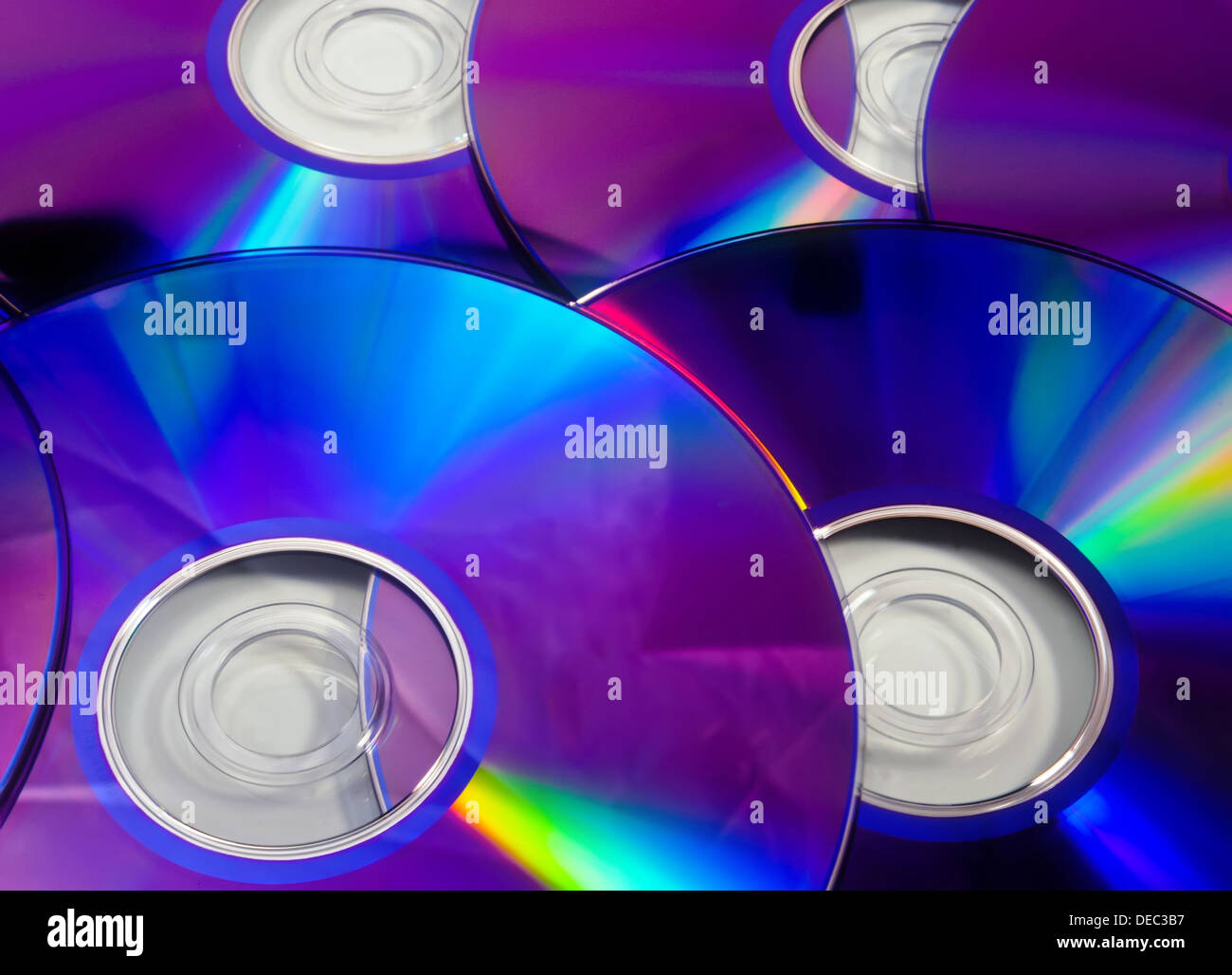 Arcobaleno colorato sfondo costituito da dischi DVD Foto Stock